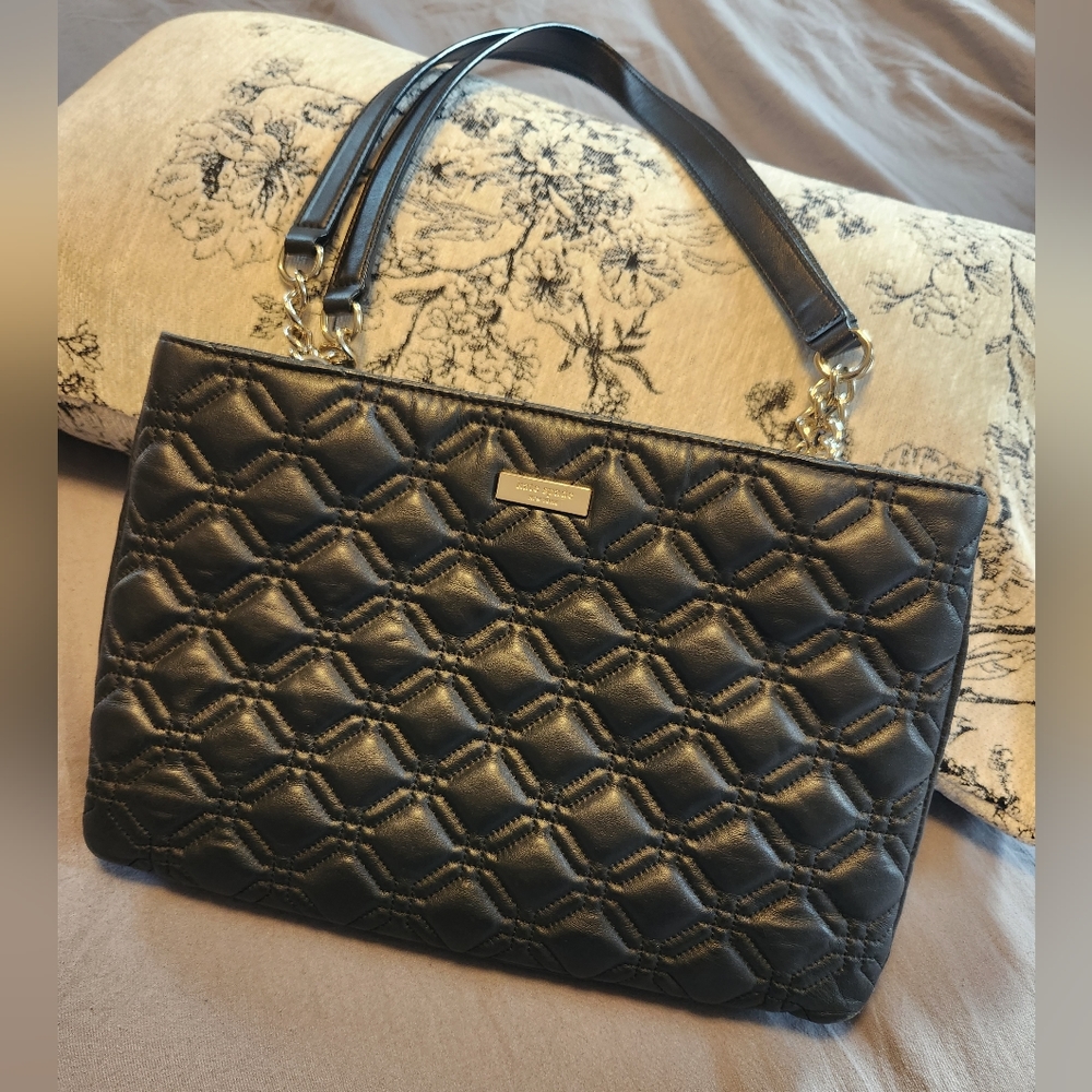 Kate Spade quilted leathery black purse.